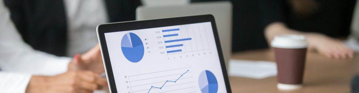 Black,Project,Manager,Working,On,Computer,Analyzing,Statistics,On,Screen