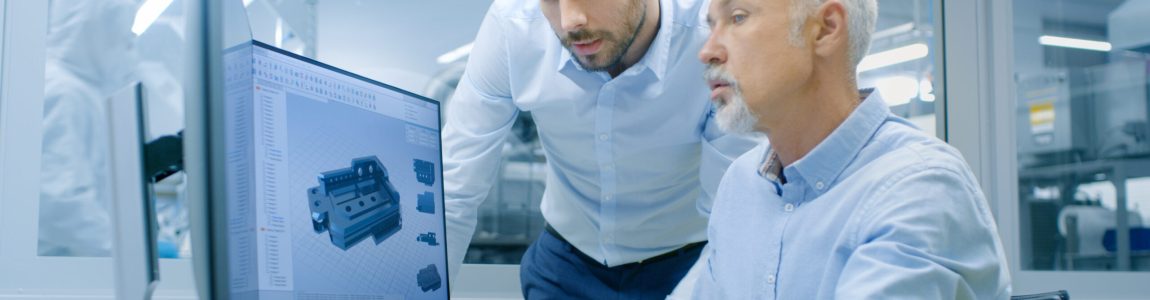 Industrial,Designer,Has,Conversation,With,Senior,Engineer,While,Working,In