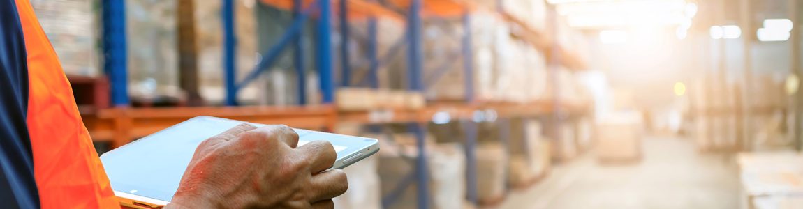 The  man holding tablet to checking the stock products,Employee